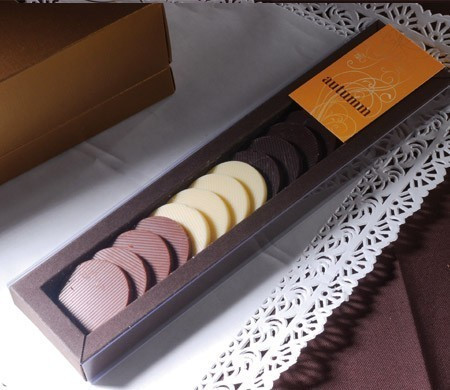 Boîte avec couverture coulissante pour des bonbons