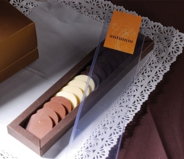 Boîte avec couverture coulissante pour des bonbons