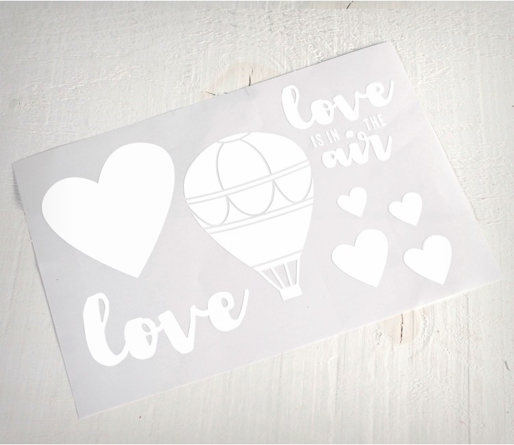 Sticker décoratif "Love is in the air" Sticker décoratif "Love is in the air"