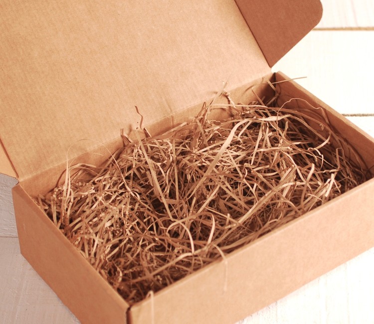 Copeaux de papier pour garniture de boîtes en carton