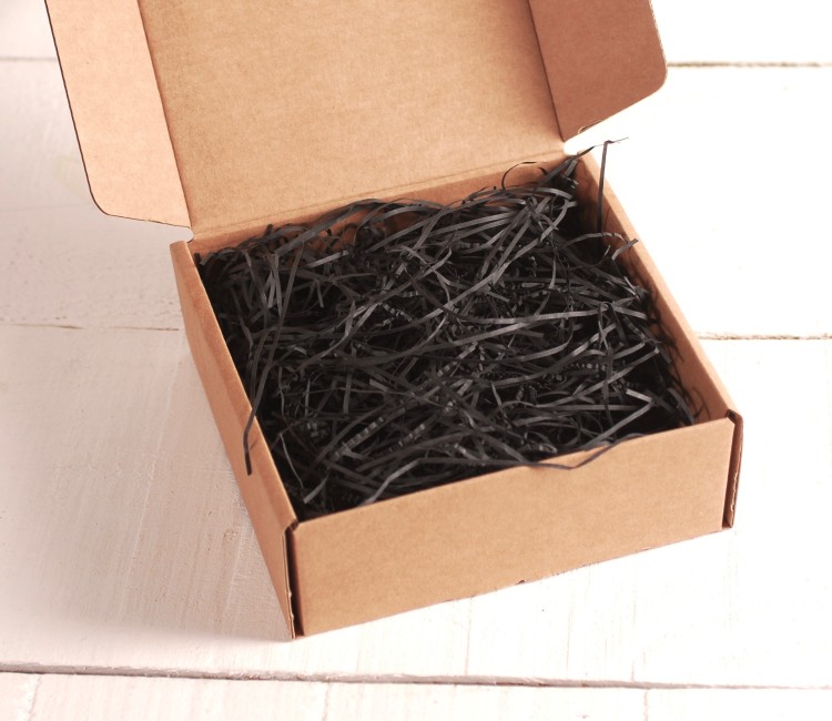 Copeaux de papier pour garniture de boîtes en carton