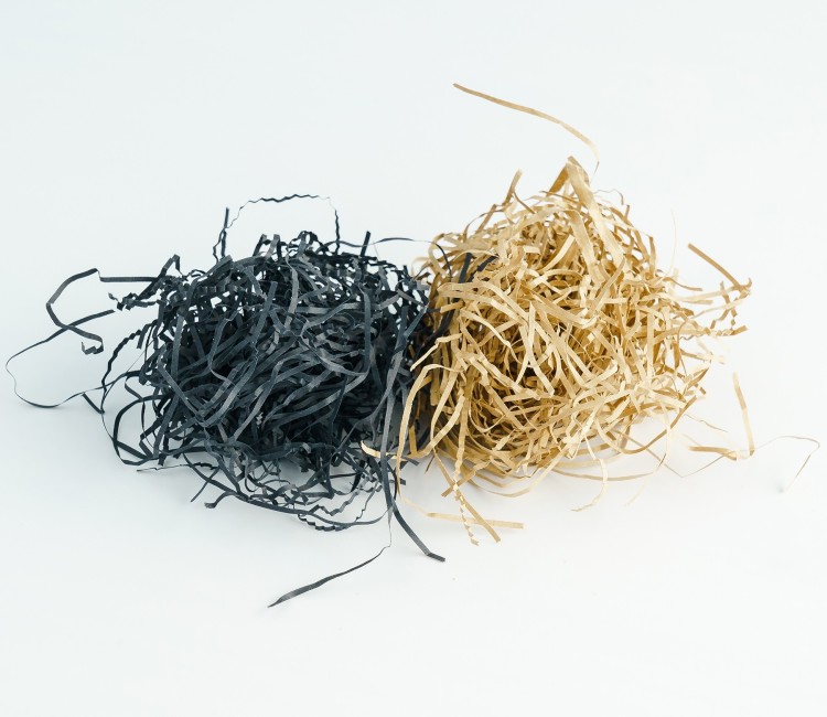 Copeaux de papier pour garniture de boîtes en carton