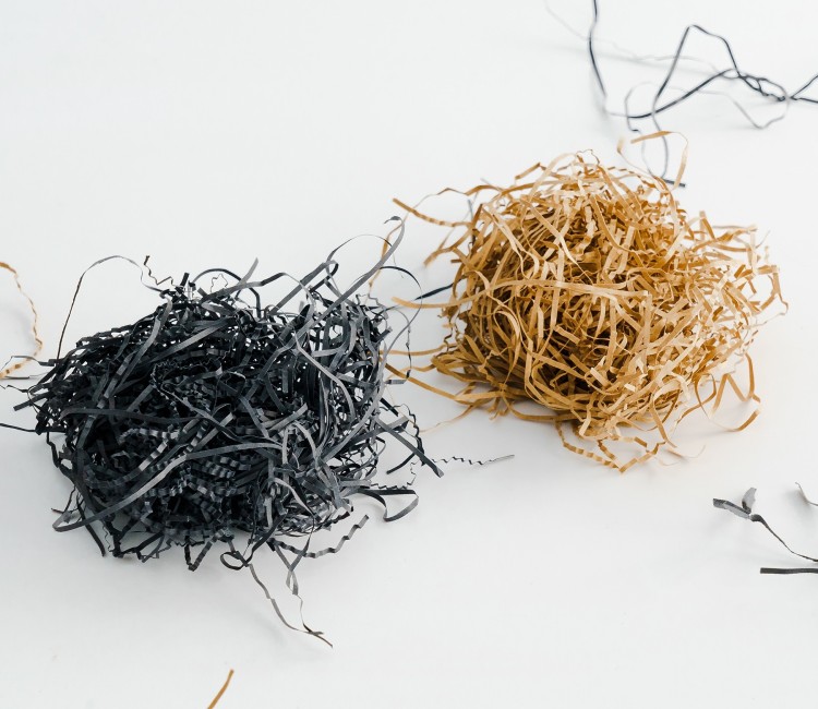Copeaux de papier pour garniture de boîtes en carton