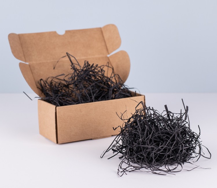 Copeaux de papier pour garniture de boîtes en carton