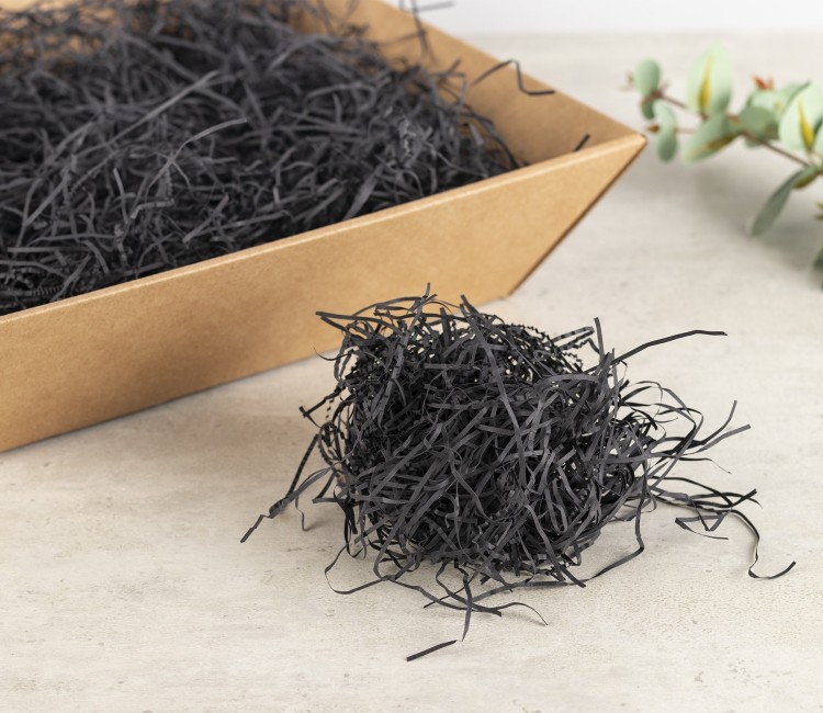 Copeaux de papier pour garniture de boîtes en carton