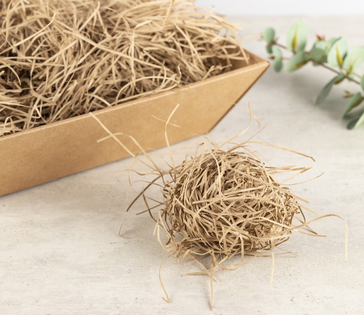 Copeaux de papier pour garniture de boîtes en carton