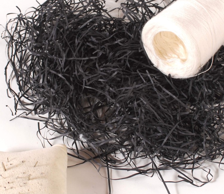 Copeaux de papier pour garniture de boîtes en carton
